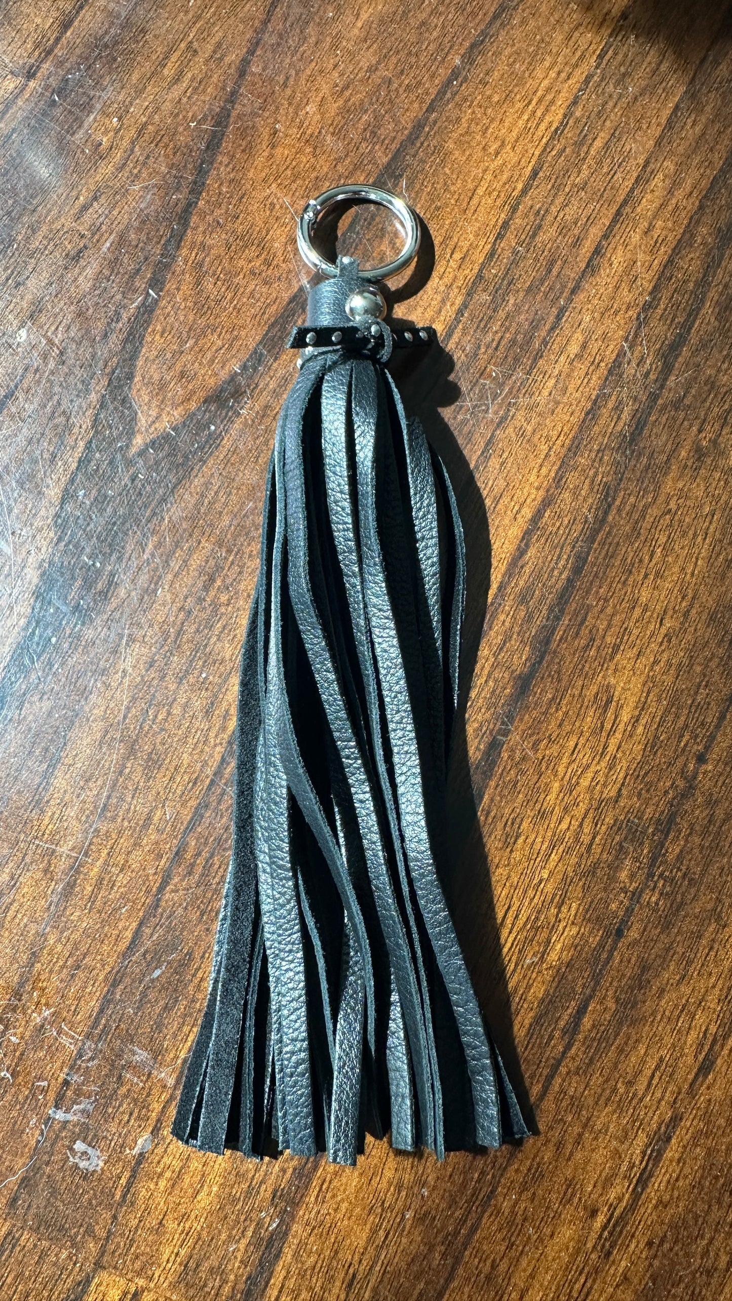 Pebbled Leather Black Tassel with Riveted Tie