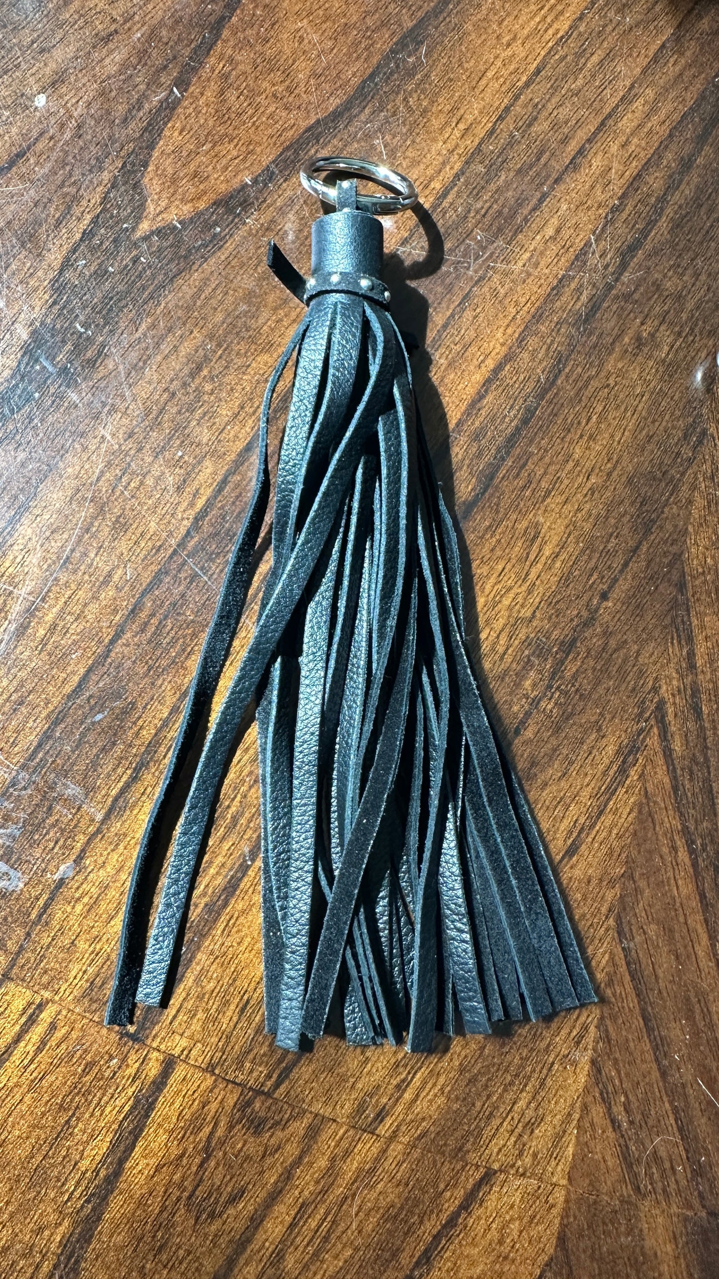 Pebbled Leather Black Tassel with Riveted Tie