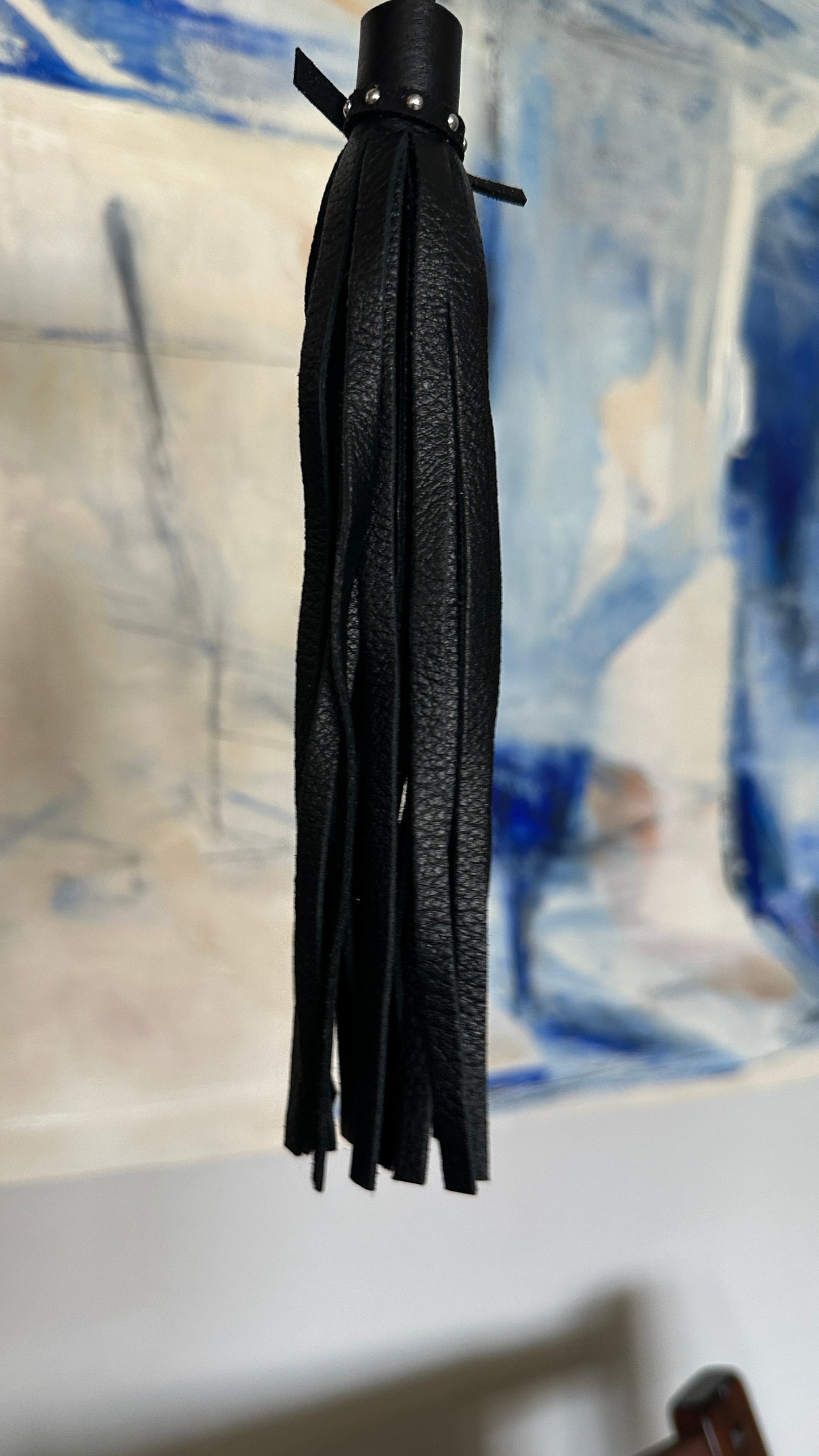 Pebbled Leather Black Tassel with Riveted Tie