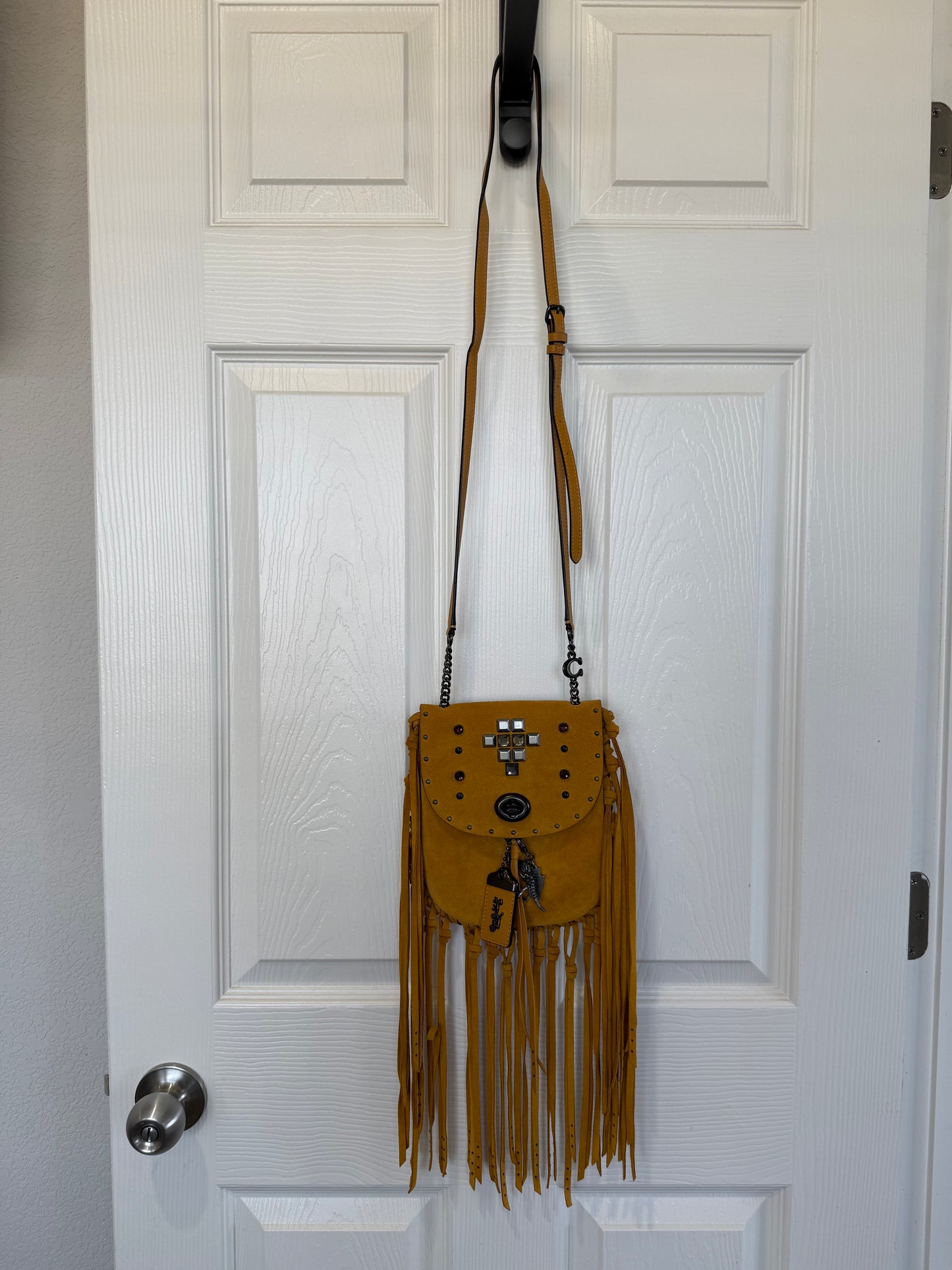 Coach Mustard Yellow Suede Fringe Saddle Crossbody Bag with original charm- EUC Pre-loved