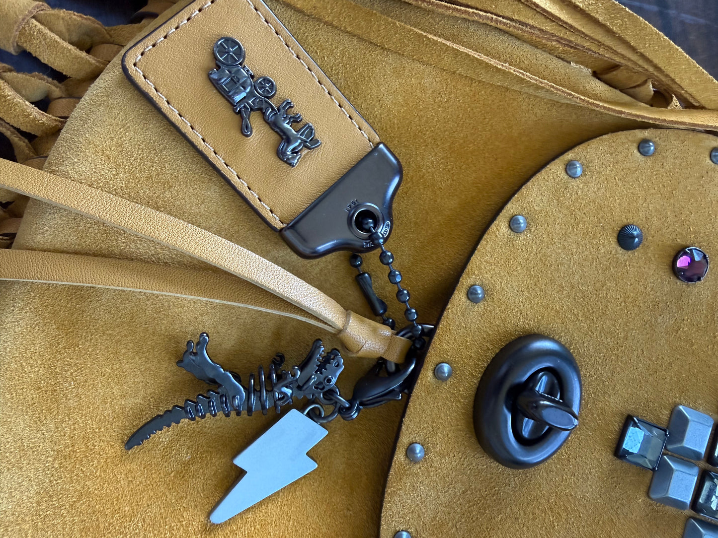 Coach Mustard Yellow Suede Fringe Saddle Crossbody Bag with original charm- EUC Pre-loved