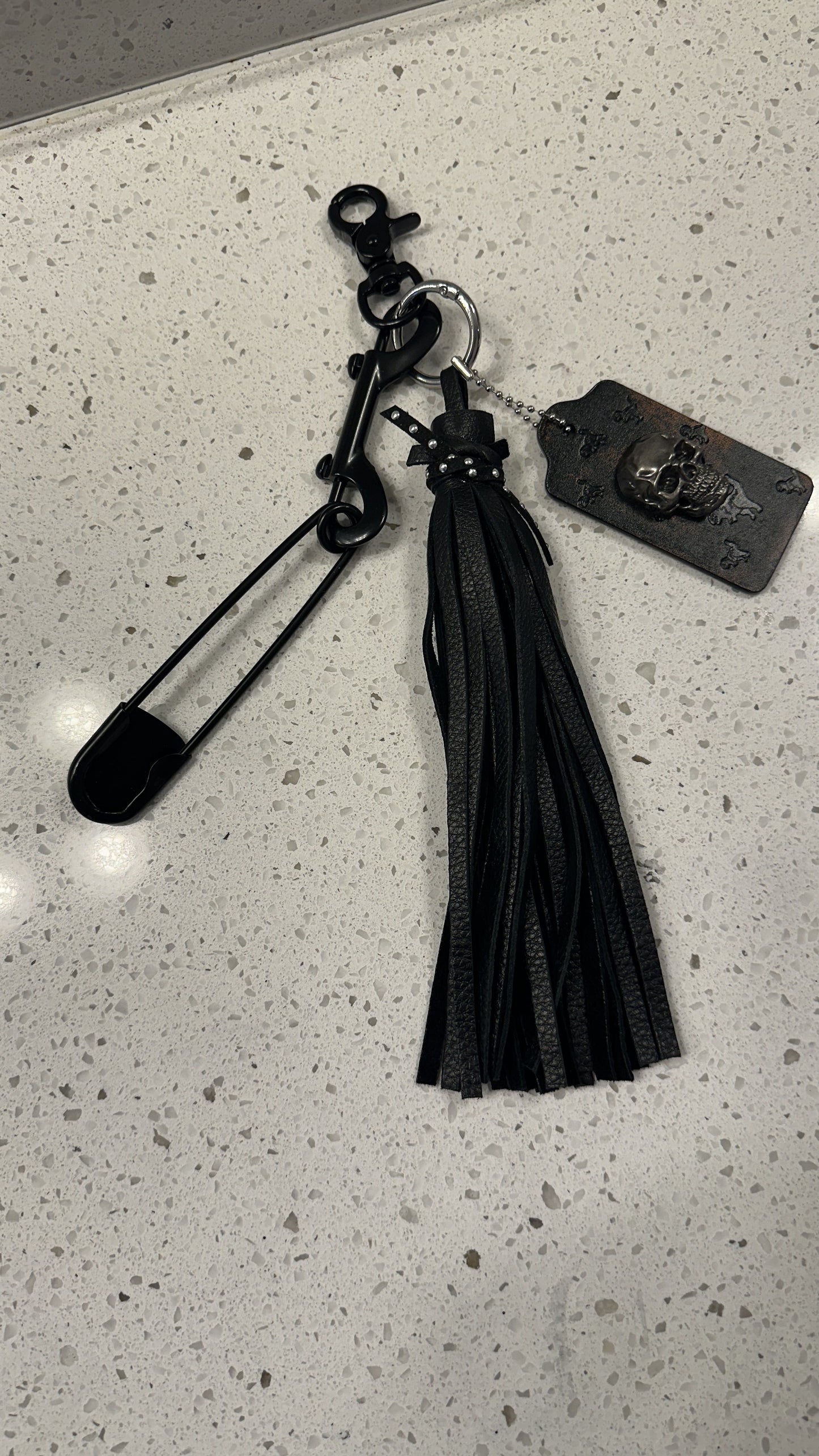 Upcrafted Coach Hangtag, Safety Pin, and Pebbled Leather Tassel Bag Charm Cluster