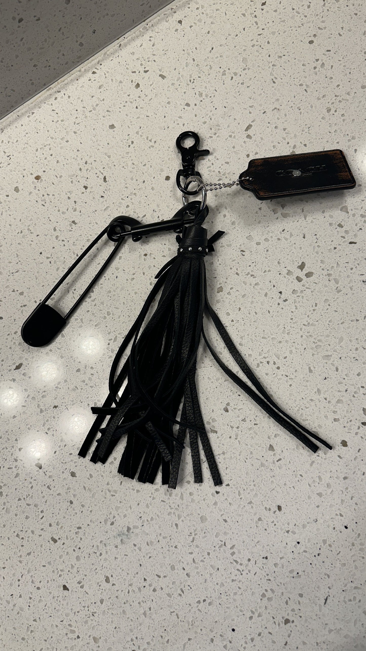 Upcrafted Coach Hangtag, Safety Pin, and Pebbled Leather Tassel Bag Charm Cluster