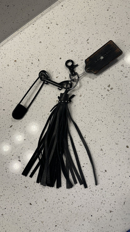 Upcrafted Coach Hangtag, Safety Pin, and Pebbled Leather Tassel Bag Charm Cluster