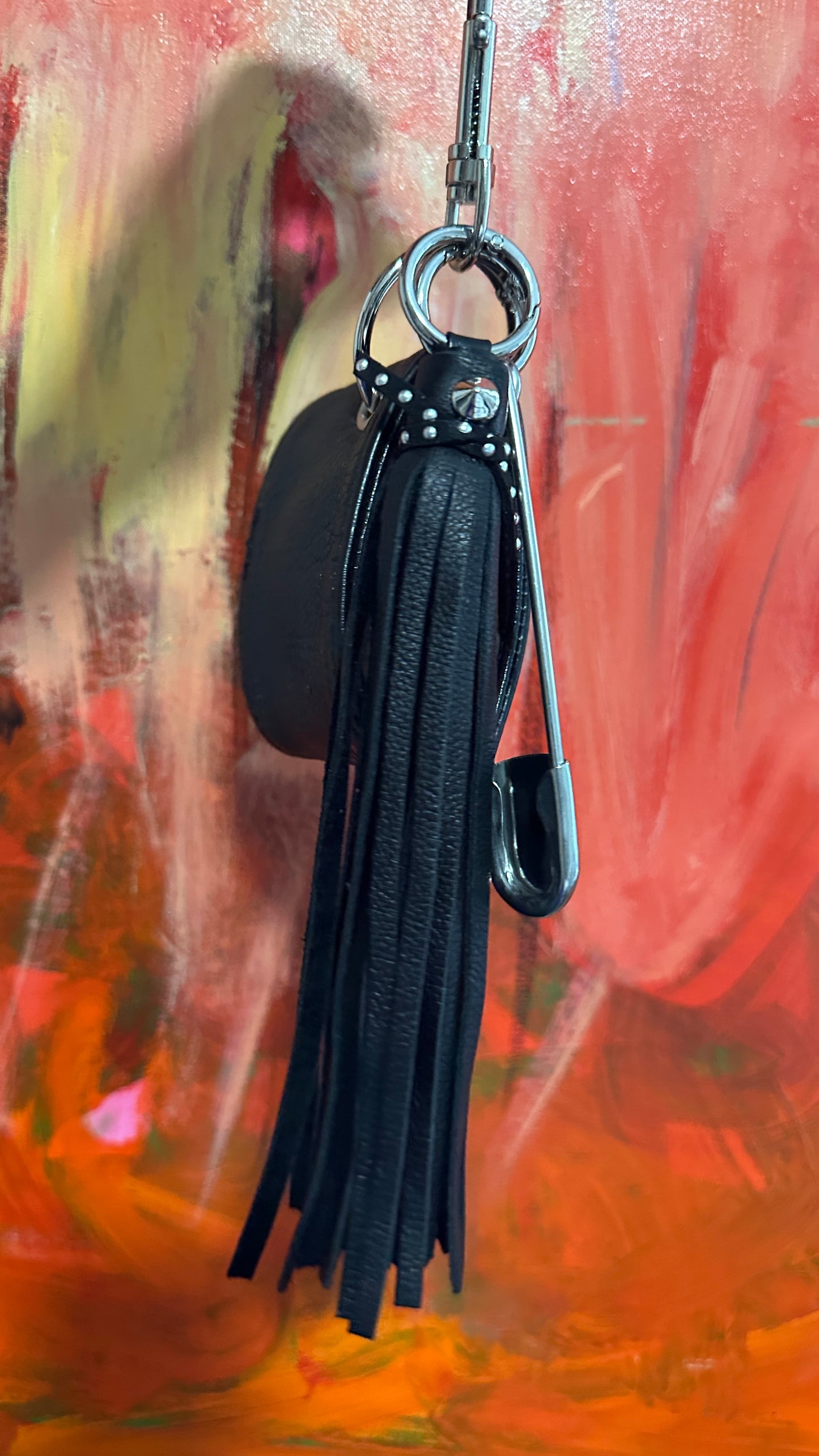 Moto-Inspired Bag Charm Cluster with Repurposed Cuff from a Coach Jacket