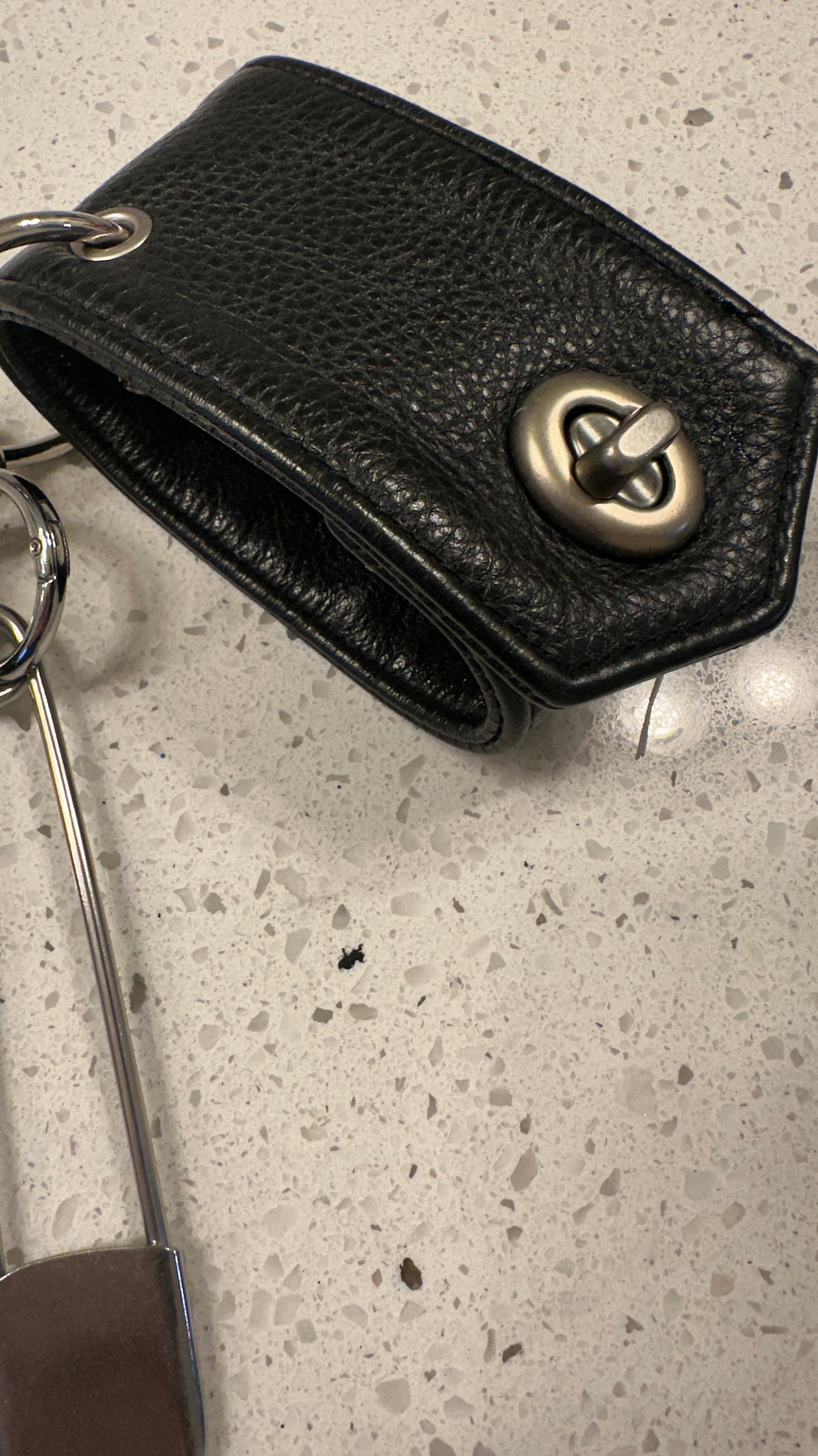 Moto-Inspired Bag Charm Cluster with Repurposed Cuff from a Coach Jacket