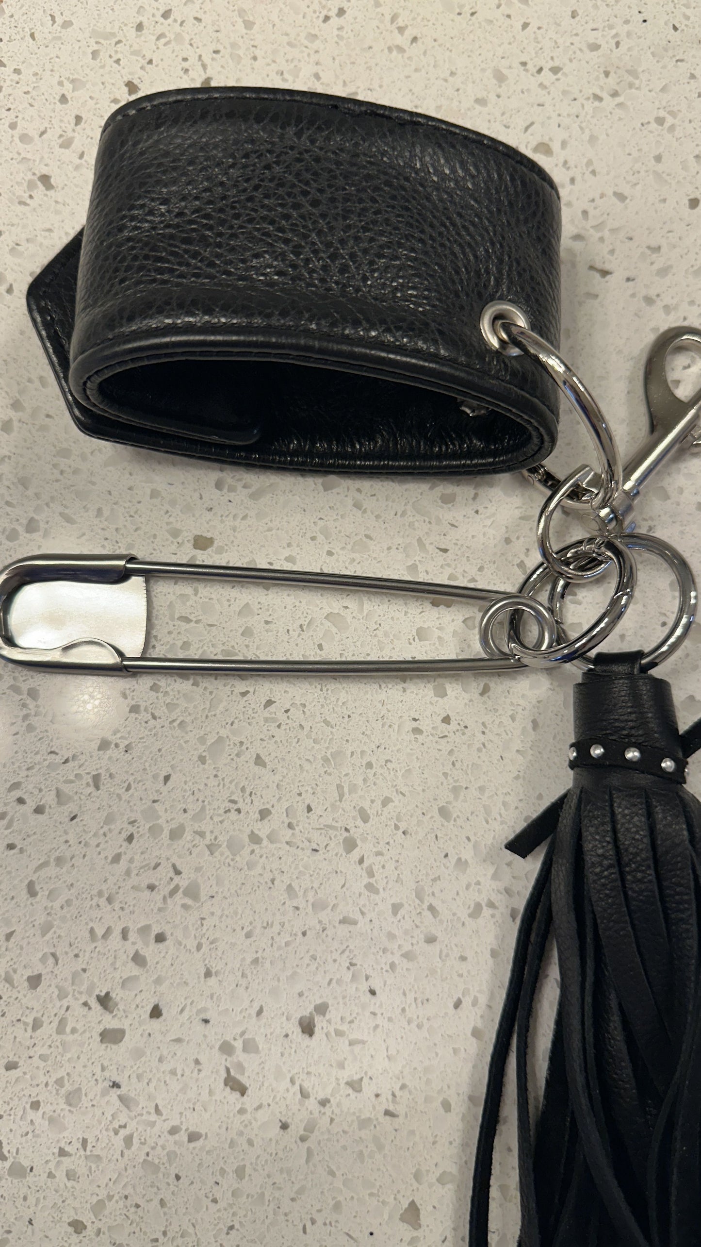Moto-Inspired Bag Charm Cluster with Repurposed Cuff from a Coach Jacket
