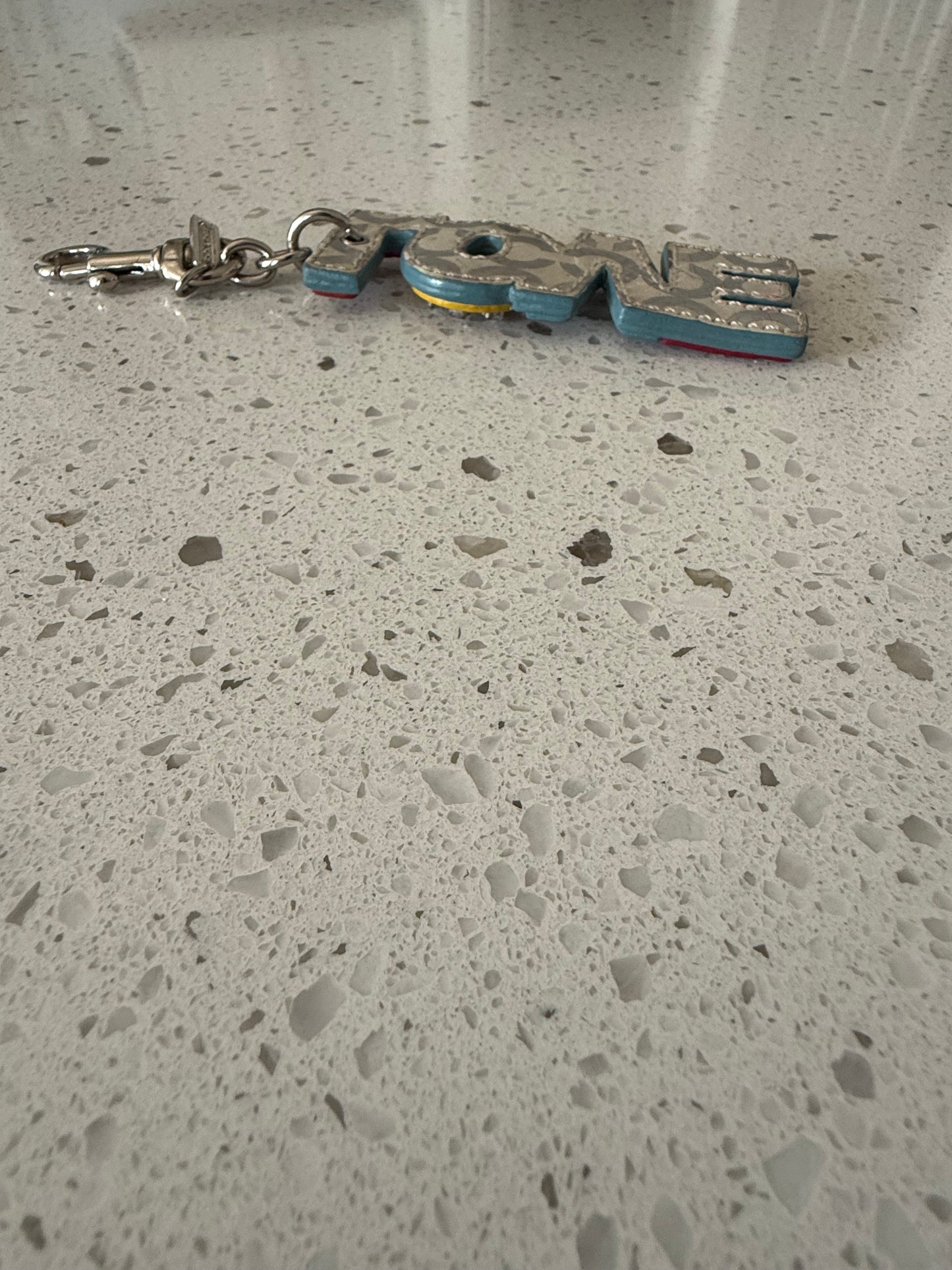 Pre-Loved Coach Multi-Color Leather "LOVE" Charm with Rhinestones Grommet Studs Optic C Print on the Back