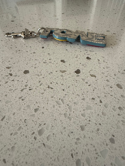 Pre-Loved Coach Multi-Color Leather "LOVE" Charm with Rhinestones Grommet Studs Optic C Print on the Back