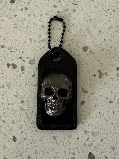 Repurposed Painted Black Coach Hangtag with Skull Rivet