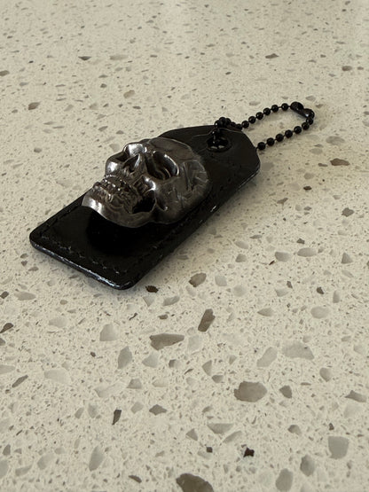 Repurposed Painted Black Coach Hangtag with Skull Rivet