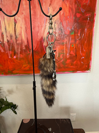 One-of-a-Kind Upcrafted Bag Charm Cluster | Faux Fur Raccoon Tail, Coach Tic Tac Toe "C" & Silver Coach Hangtag