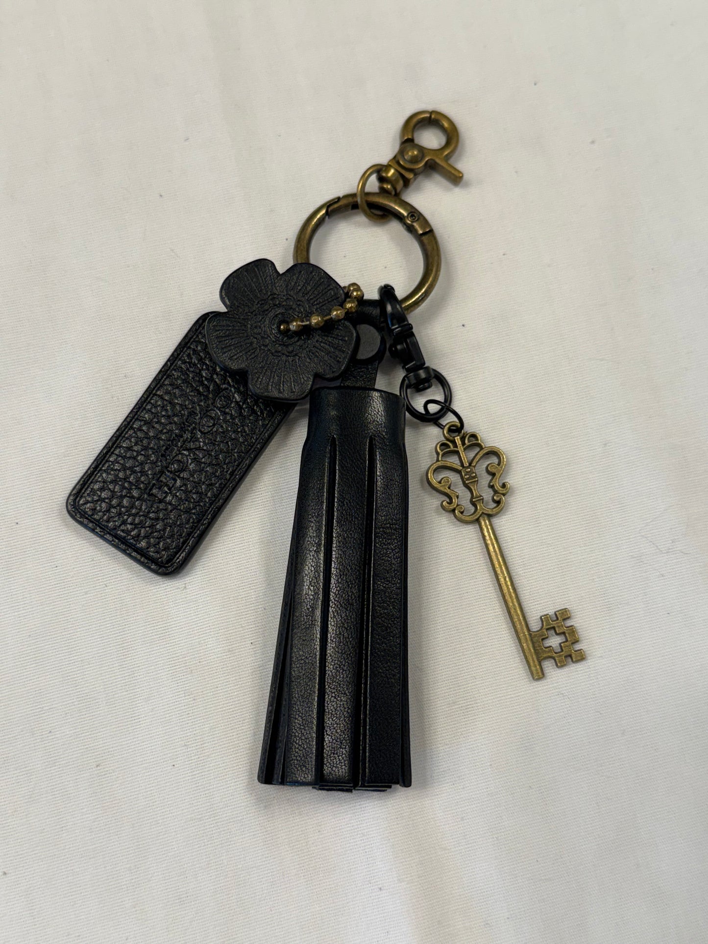 One-of-a-Kind Upcrafted Coach Bag Charm Cluster | Black Leather Tassel, Tea Rose, Hangtag & Key Charm