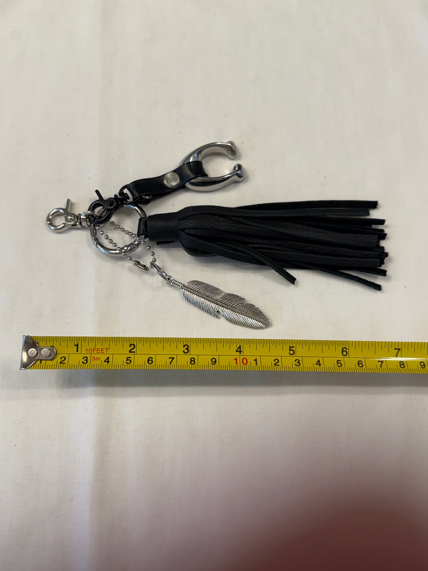 Upcrafted Bag Charm Cluster | Repurposed Coach Tic Tac Toe "C", Silver Feather & Black Pebbled Leather Tassel