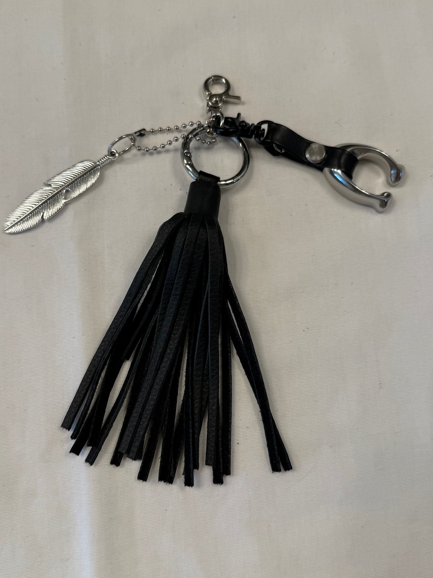 Upcrafted Bag Charm Cluster | Repurposed Coach Tic Tac Toe "C", Silver Feather & Black Pebbled Leather Tassel