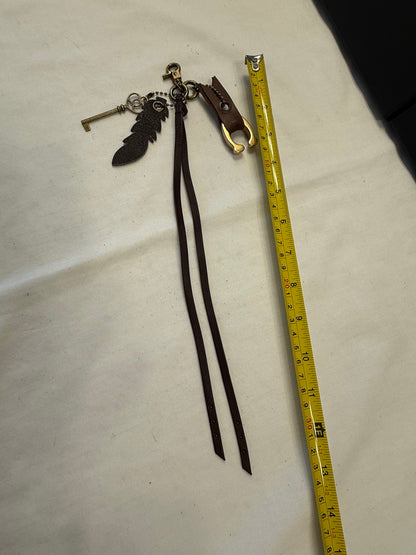 Upcrafted Bag Charm Cluster | Repurposed Coach Leather Tassel, Tic Tac Toe "C", Key & Leather Feather