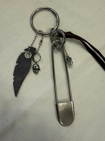 Bag Charm Cluster | Repurposed Coach Oxblood Leather Tie/Tassel, Dusty Blue Leather Feather & Skull Charms