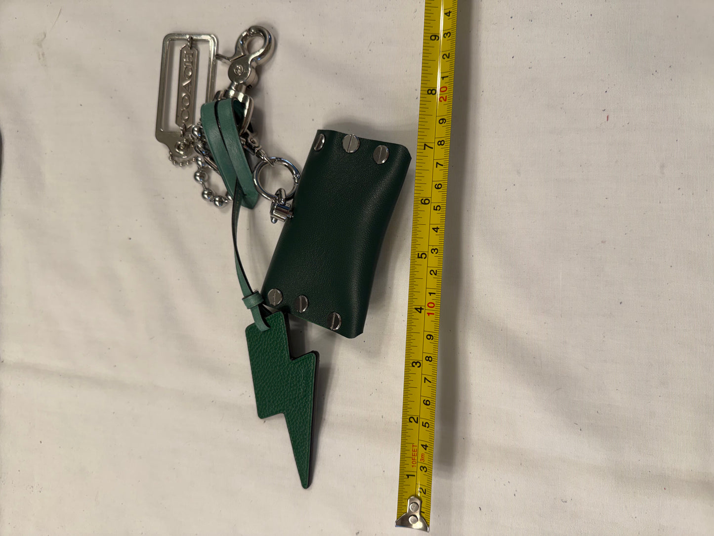 One-of-a-Kind Upcrafted Coach Bag Charm Cluster | Re(Loved) Lightning Bolt, Card Pouch & Silver Coach Hangtag