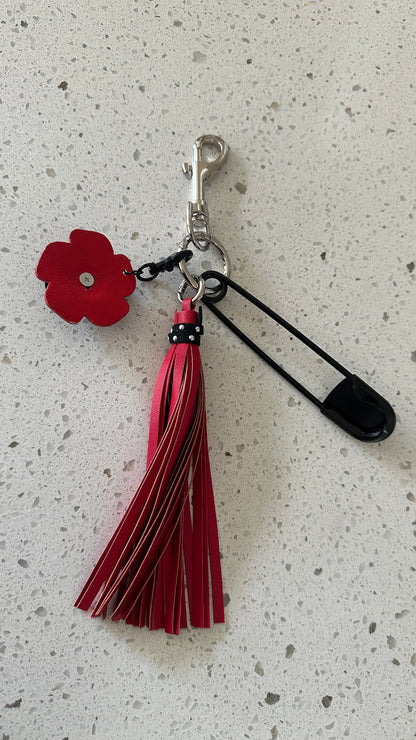 Repurposed Coach Tea Rose Skull, Safety Pin & Red Tassel Bag Charm Cluster