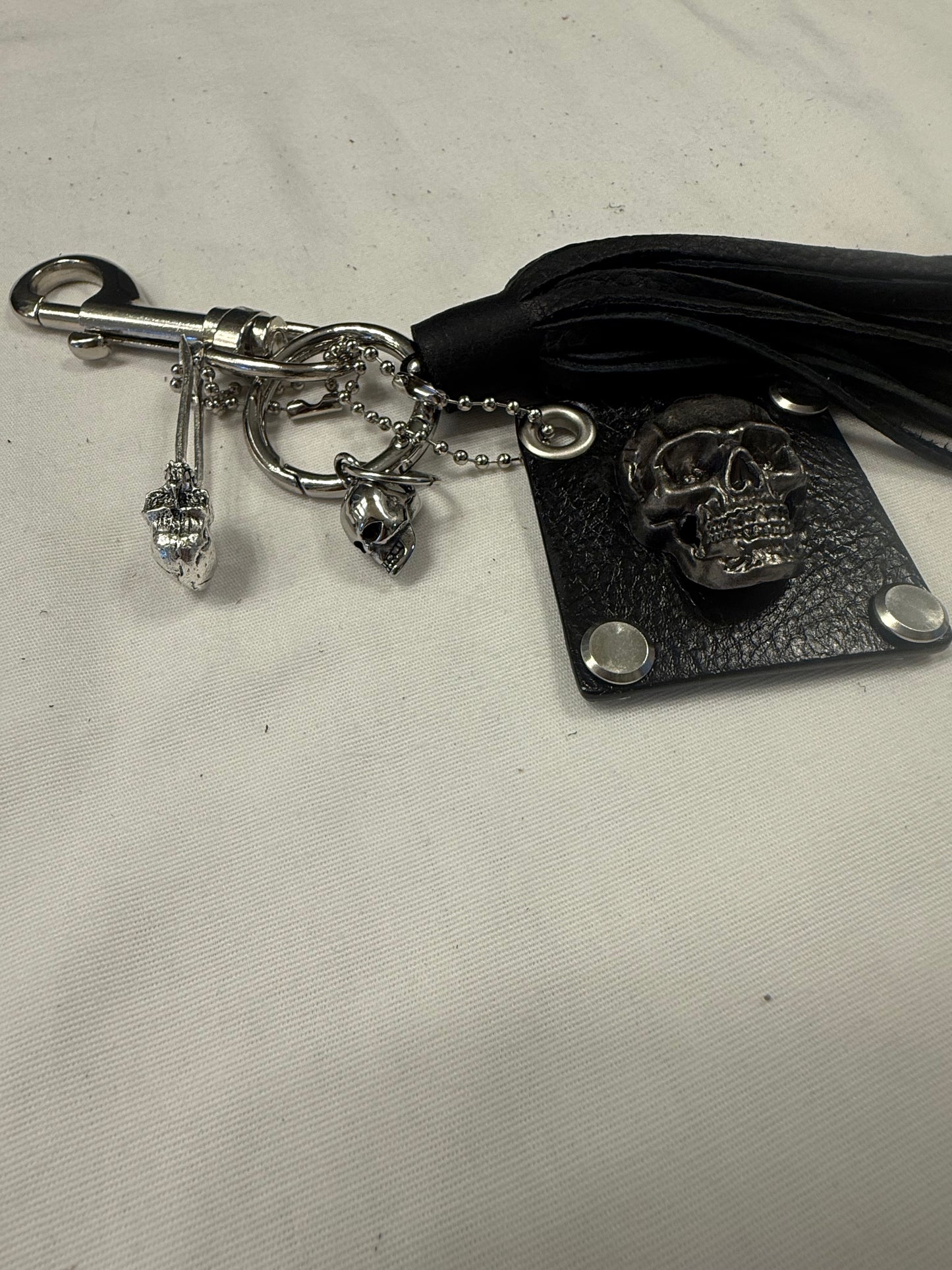 Repurposed Kate Spade Leather Skull Bag Charm Cluster – Black Pebbled Leather Tassel – Gothic Luxe – Silver Tone Hardware
