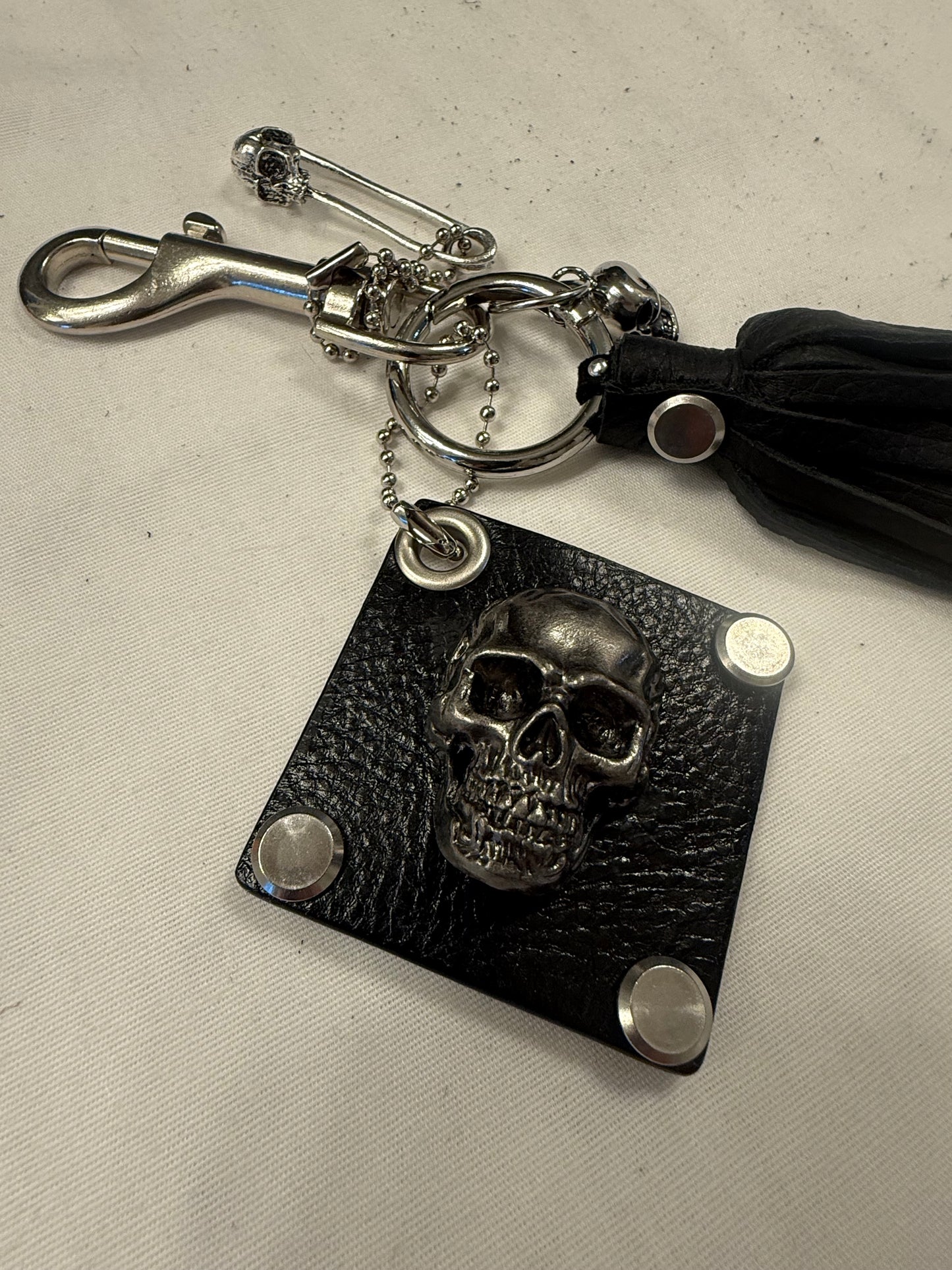 Repurposed Kate Spade Leather Skull Bag Charm Cluster – Black Pebbled Leather Tassel – Gothic Luxe – Silver Tone Hardware
