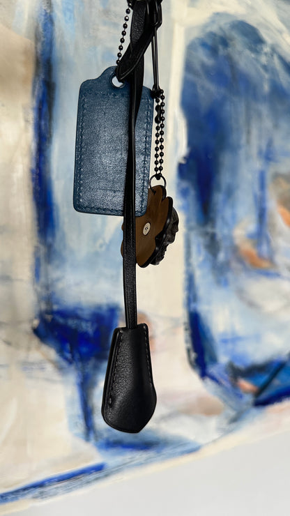 Coach Repurposed Leather Tea Roses with Skull Pin, Coach Clochette, and Painted Coach Hangtag with Black Skull Charm Bag Cluster