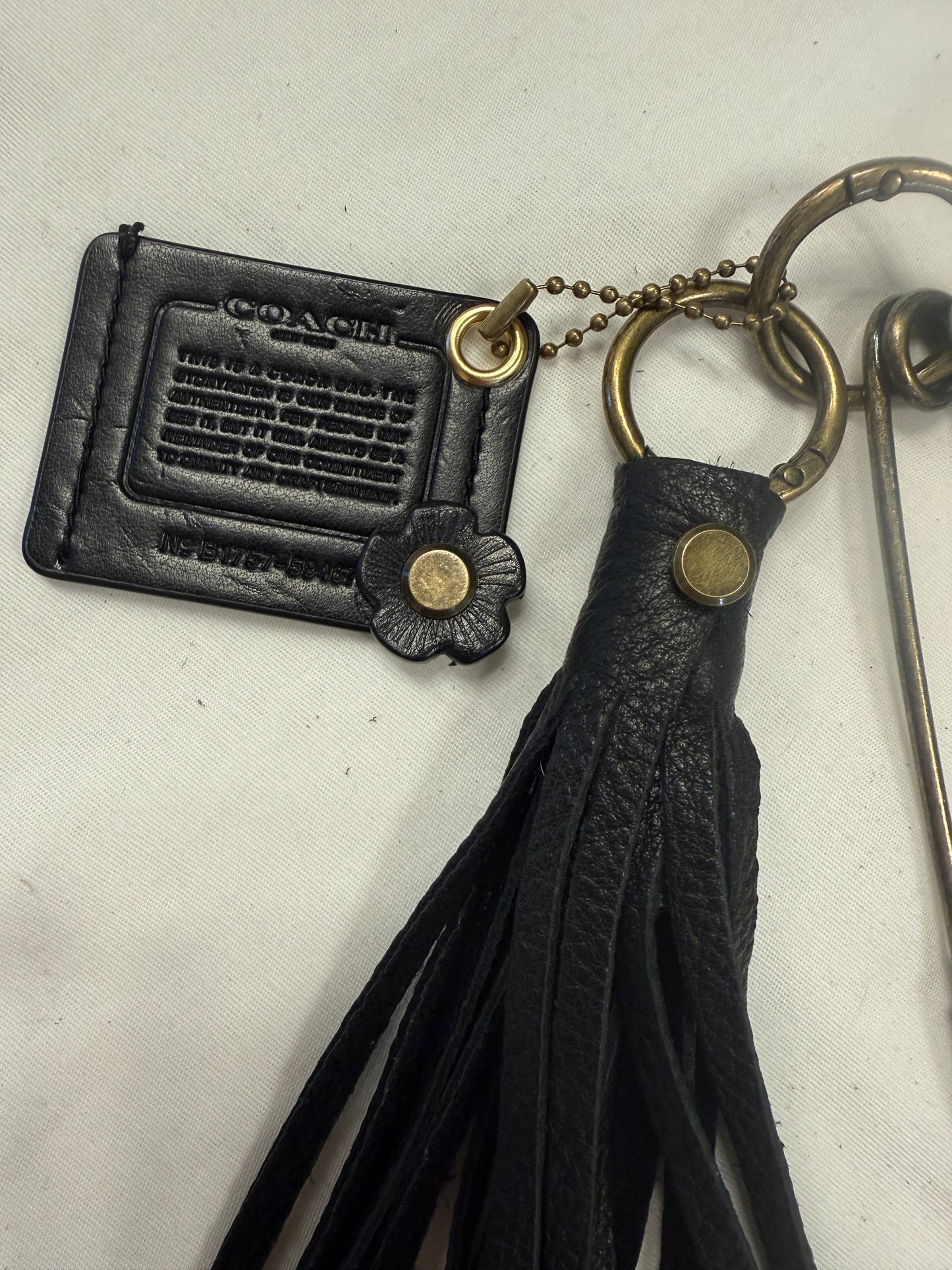 Upcrafted Coach Storypatch & Tea Rose Bag Charm – Repurposed Coach Creed Patch – Black Leather Tassel – Antique Brass Hardware – One of a Kind