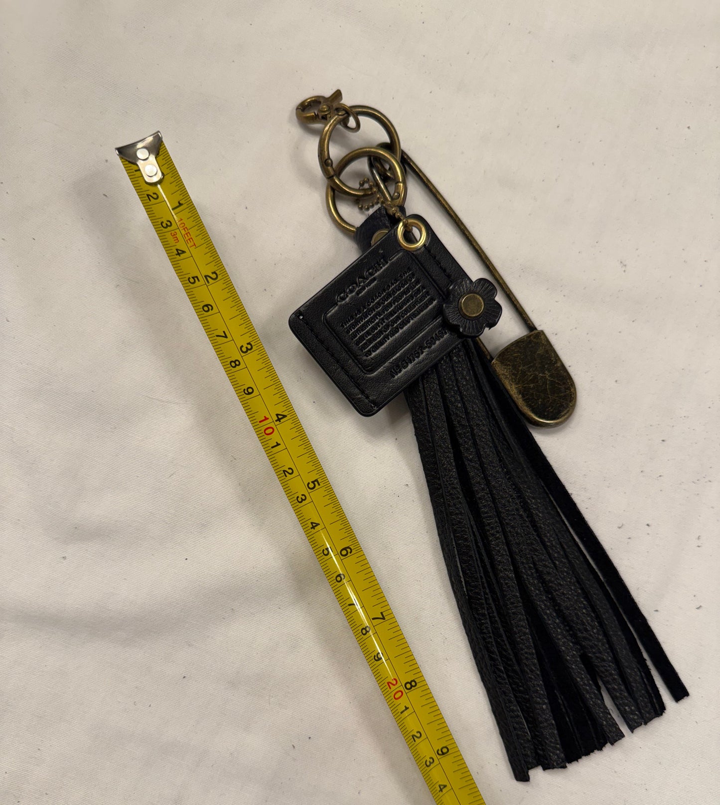 Upcrafted Coach Storypatch & Tea Rose Bag Charm – Repurposed Coach Creed Patch – Black Leather Tassel – Antique Brass Hardware – One of a Kind