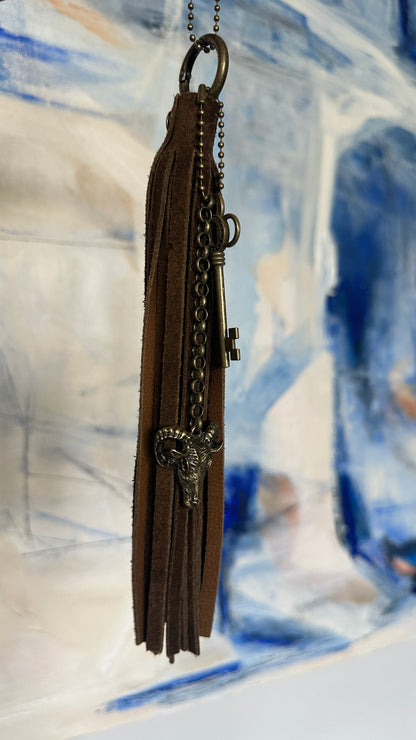 Bag Charm Cluster with Brown Sueded Tassel and Key and Ram Head Charm Antique Brass Hardware