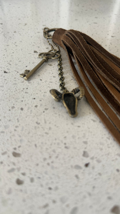 Bag Charm Cluster with Brown Sueded Tassel and Key and Ram Head Charm Antique Brass Hardware