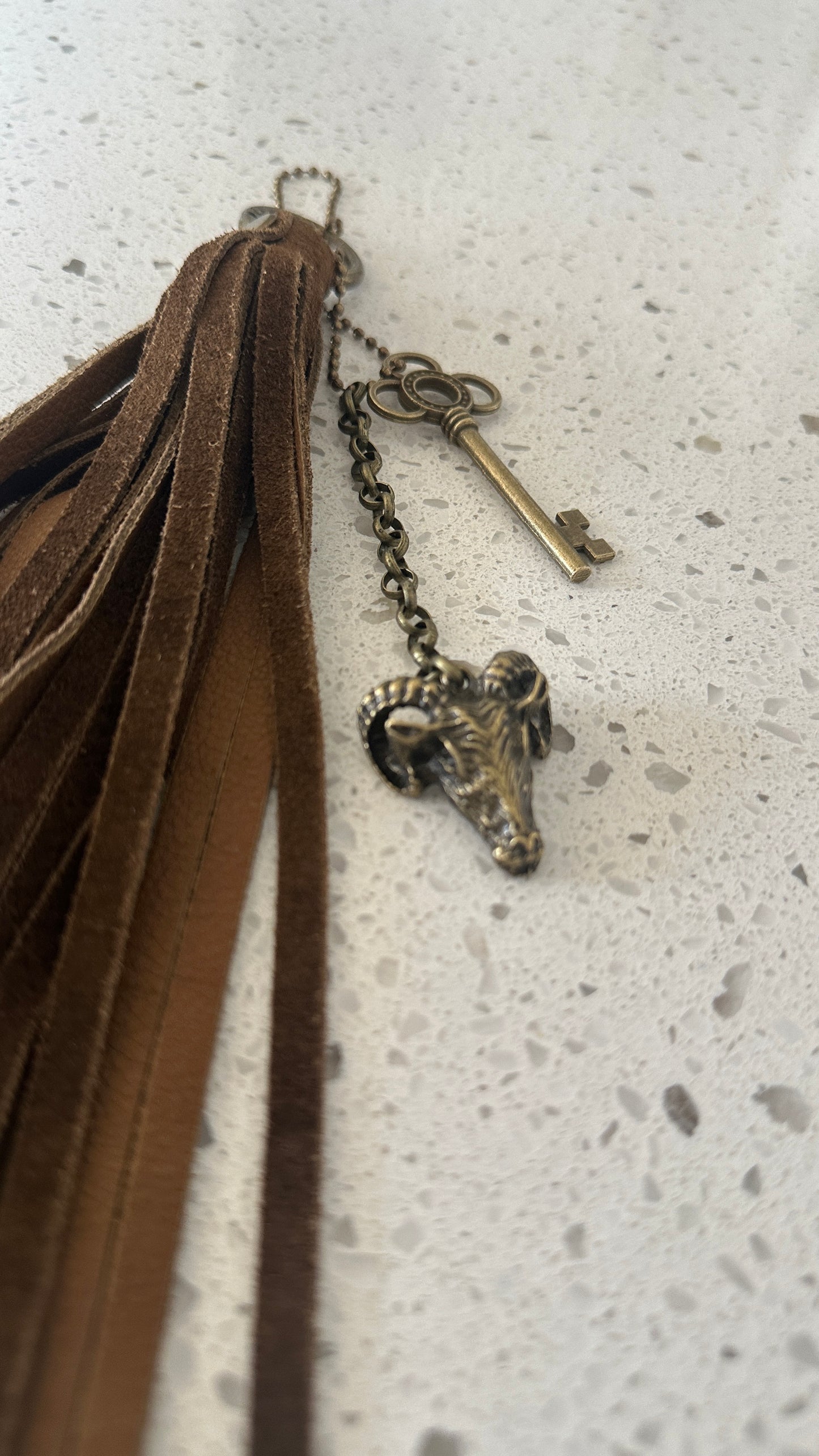 Bag Charm Cluster with Brown Sueded Tassel and Key and Ram Head Charm Antique Brass Hardware