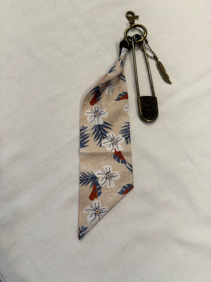 Tan & Blue Floral Scarf, Safety Pin, and Feather Bag Charm Cluster on Antique Brass Tone Hardware