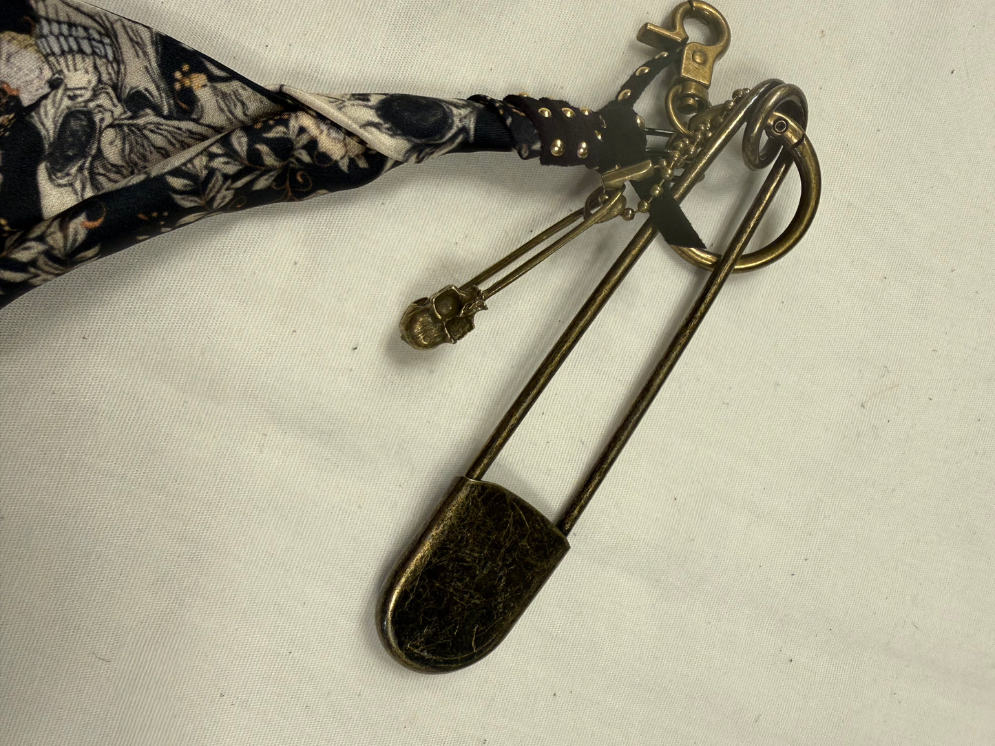 Skull Scarf Bag Charm Cluster with Antique Brass Hardware