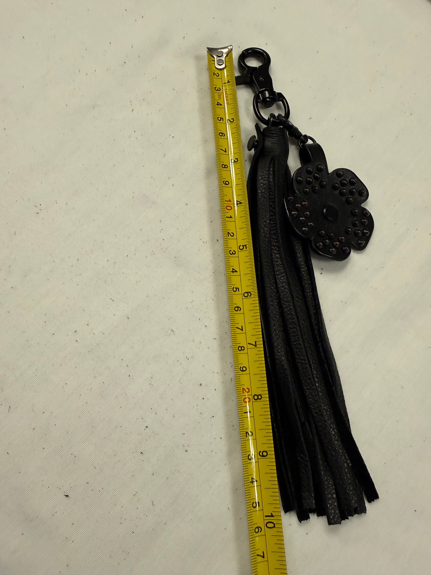 Black Pebbled Leather Tassel with Repurposed Coach Tea Rose