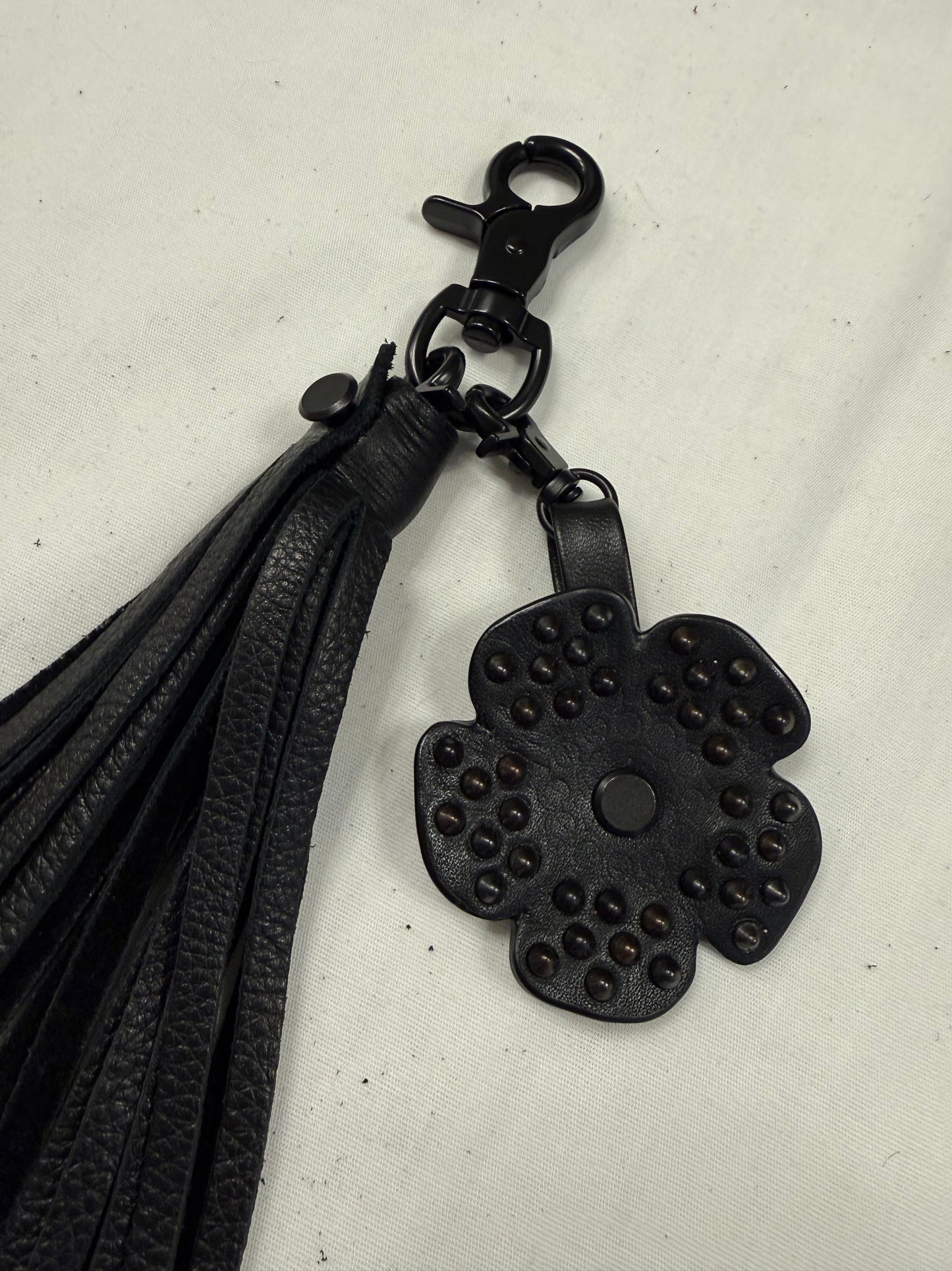 Black Pebbled Leather Tassel with Repurposed Coach Tea Rose