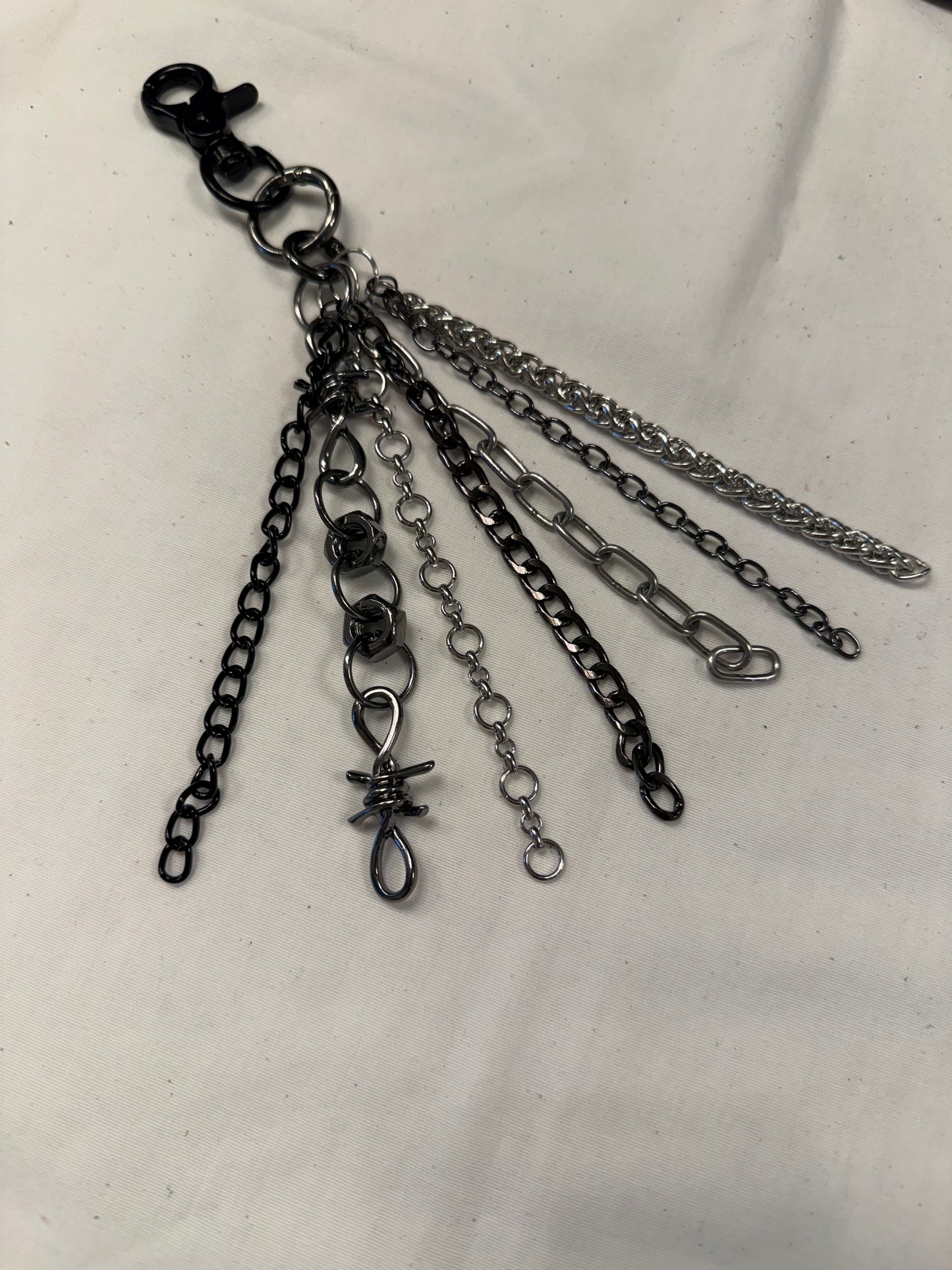 Mixed-Metal Seven-Chain Tassel Bag Charm – Black, Silver & Gunmetal