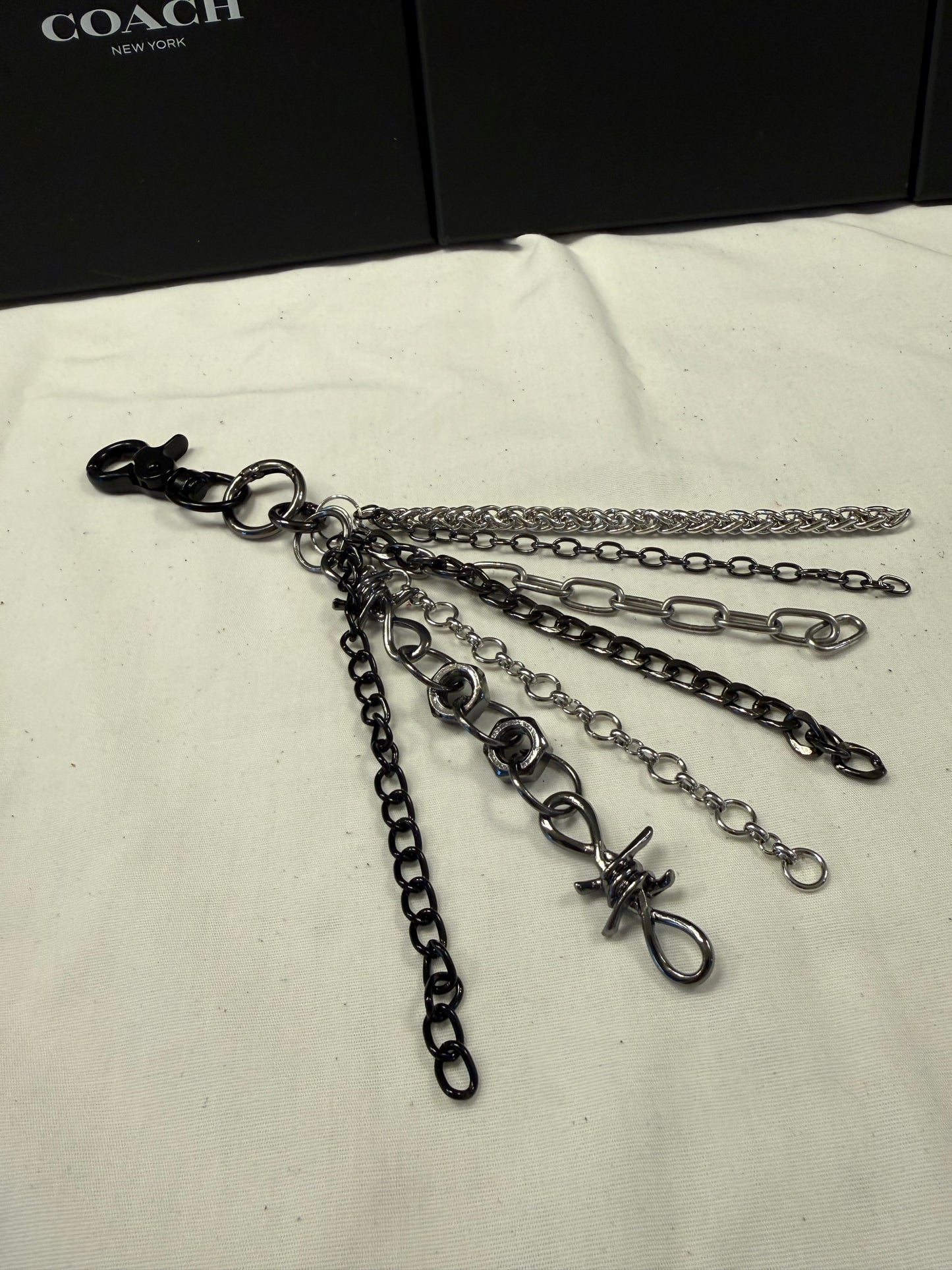 Mixed-Metal Seven-Chain Tassel Bag Charm – Black, Silver & Gunmetal