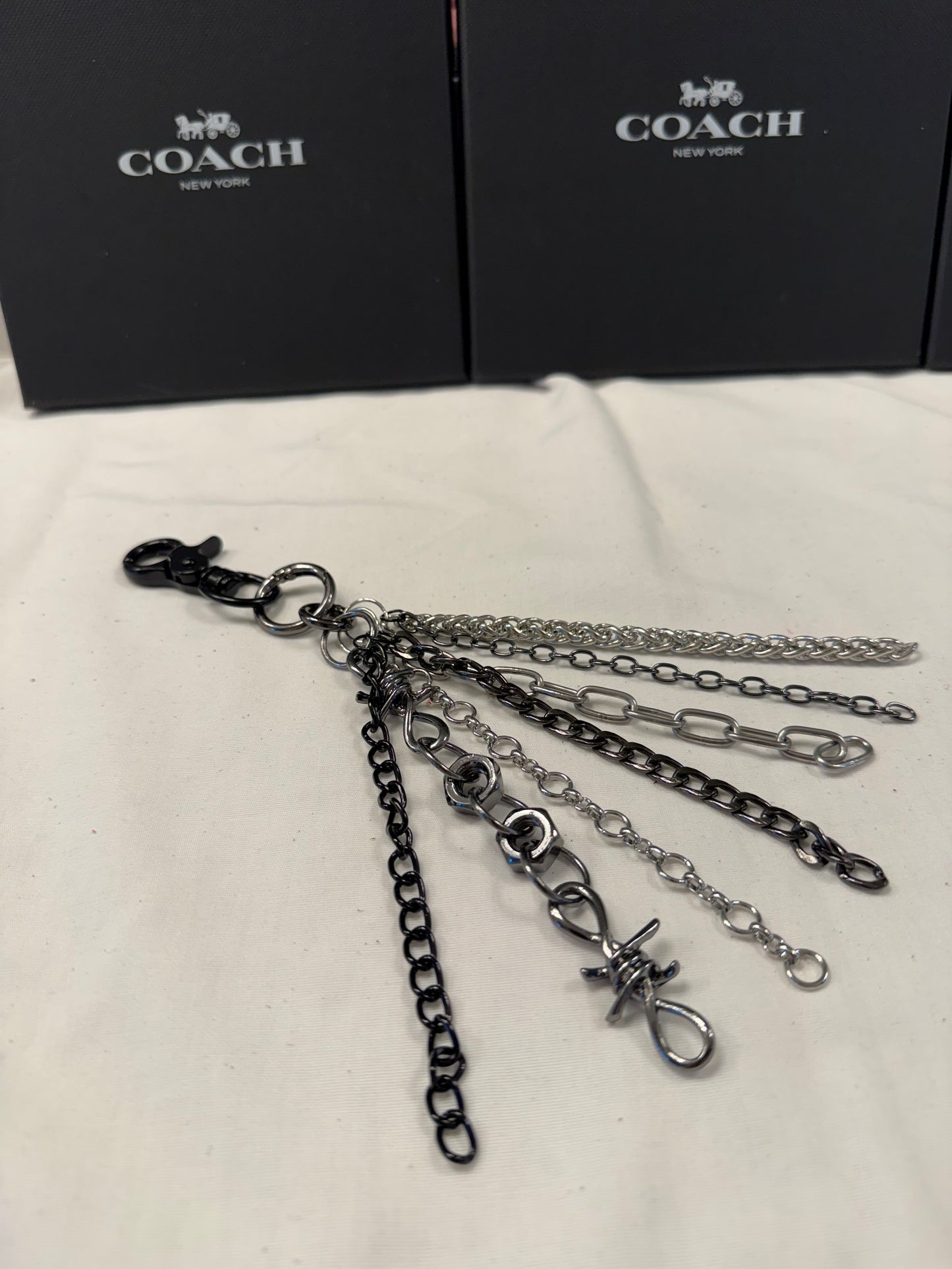 Mixed-Metal Seven-Chain Tassel Bag Charm – Black, Silver & Gunmetal