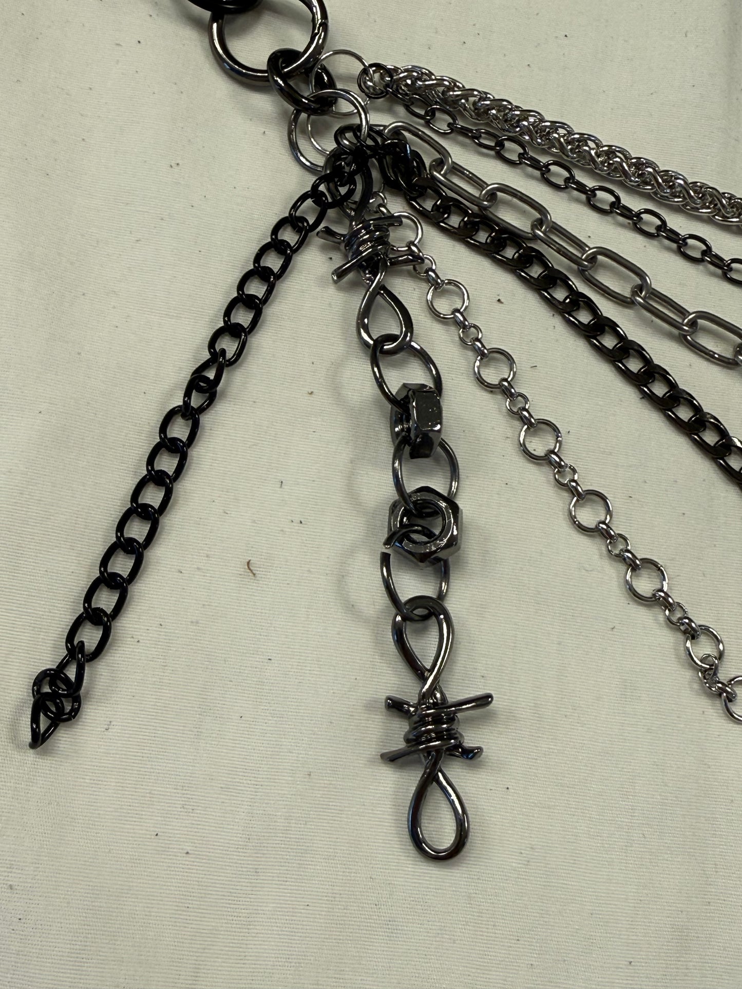Mixed-Metal Seven-Chain Tassel Bag Charm – Black, Silver & Gunmetal