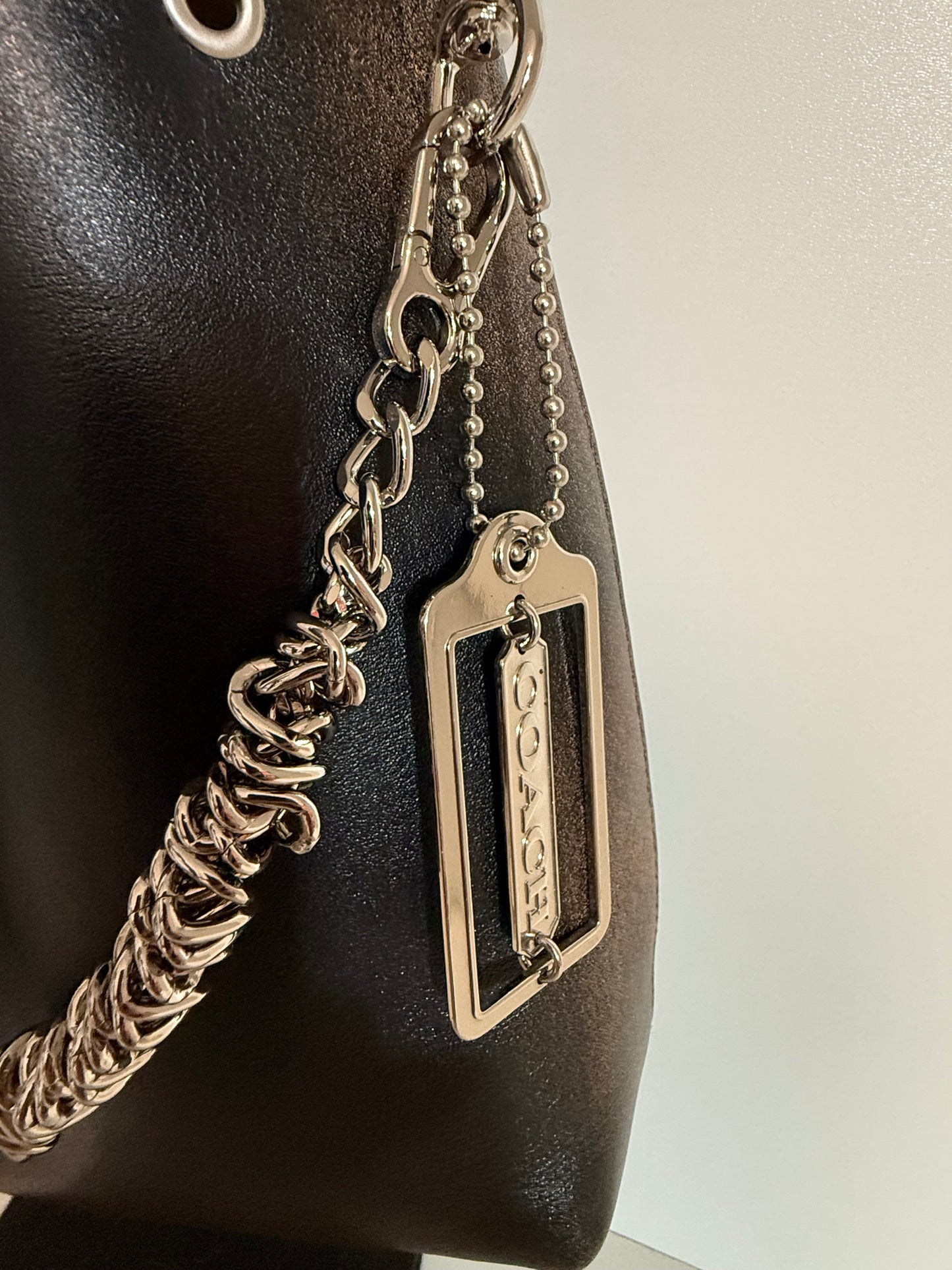 Silver-Tone Bag Chain with Black Leather Tassel & Coach Hangtag