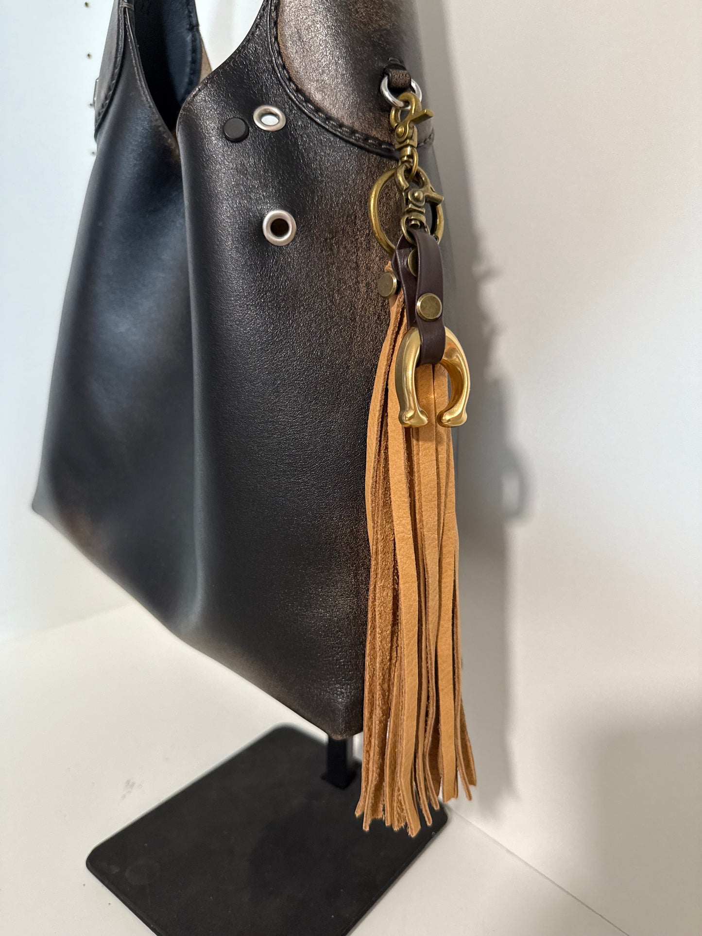 Tan Leather Tassel & Repurposed Coach “C” Bag Charm Cluster