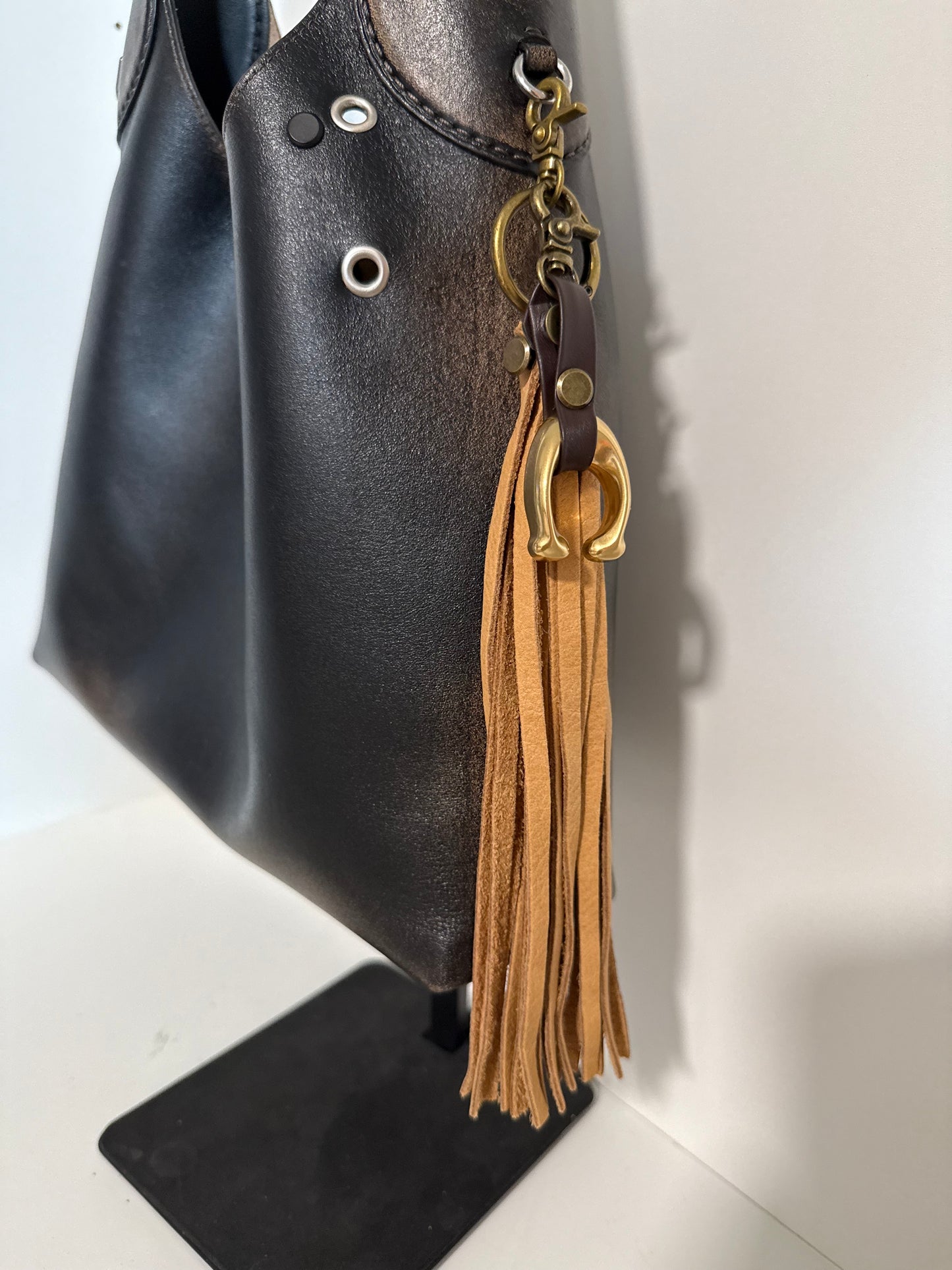 Tan Leather Tassel & Repurposed Coach “C” Bag Charm Cluster