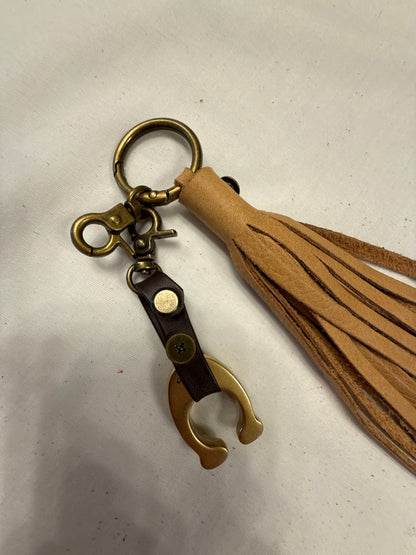 Tan Leather Tassel & Repurposed Coach “C” Bag Charm Cluster