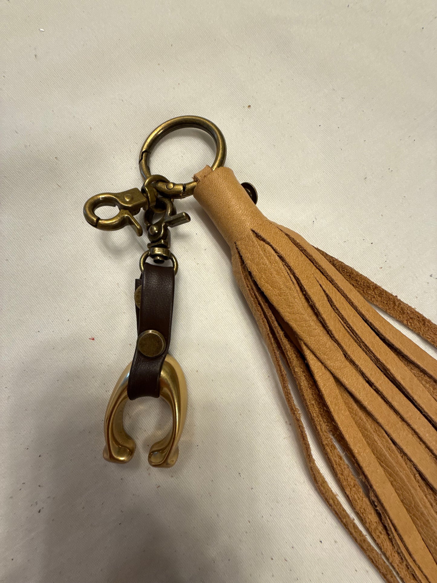 Tan Leather Tassel & Repurposed Coach “C” Bag Charm Cluster