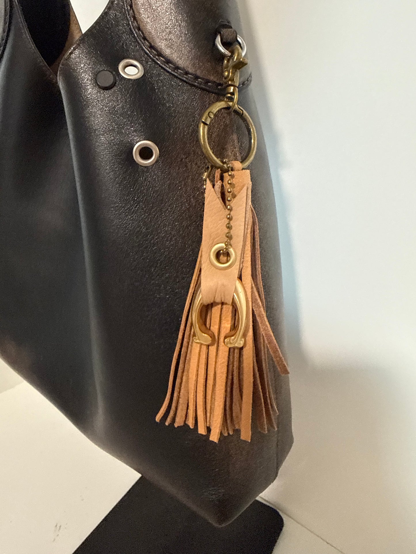 Tan Leather Tassel & Repurposed Coach “C” Bag Charm Cluster