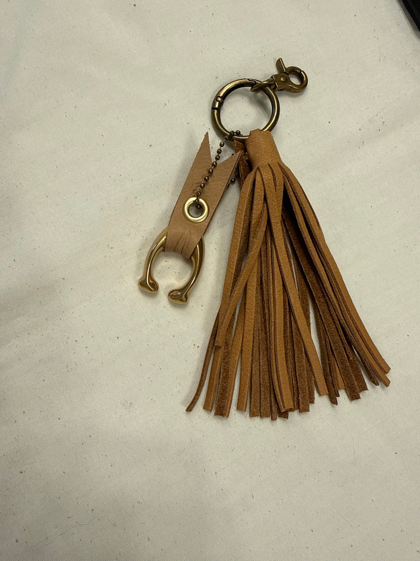 Tan Leather Tassel & Repurposed Coach “C” Bag Charm Cluster