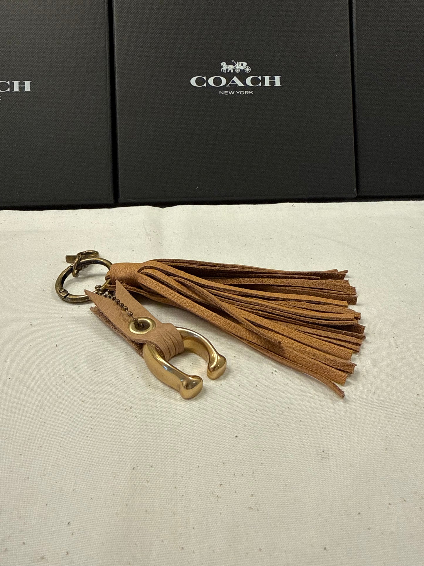 Tan Leather Tassel & Repurposed Coach “C” Bag Charm Cluster