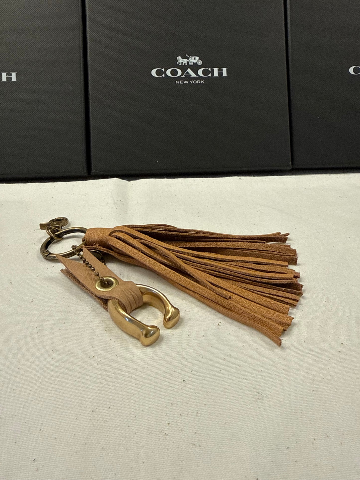 Tan Leather Tassel & Repurposed Coach “C” Bag Charm Cluster