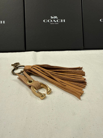 Tan Leather Tassel & Repurposed Coach “C” Bag Charm Cluster
