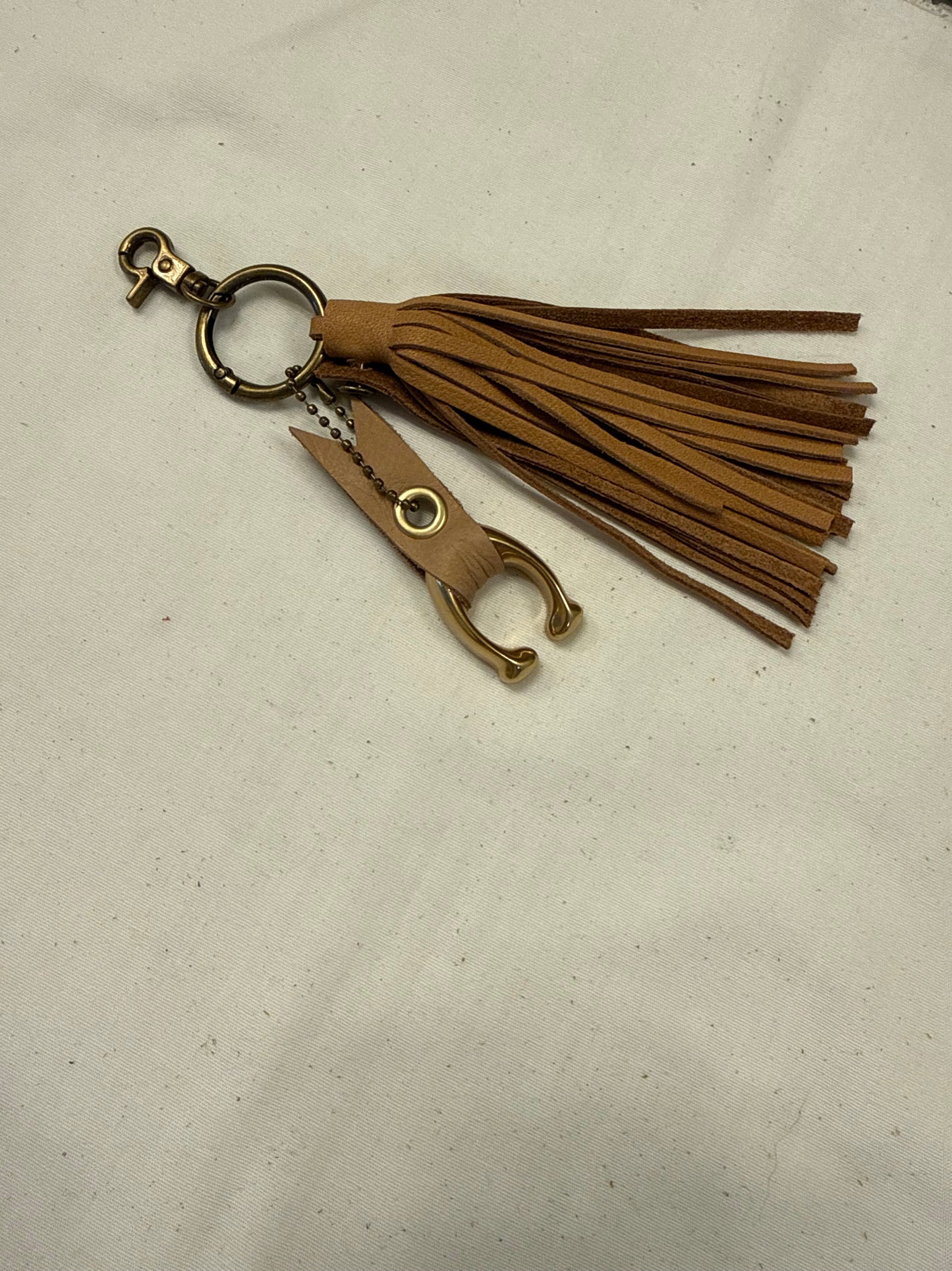 Tan Leather Tassel & Repurposed Coach “C” Bag Charm Cluster